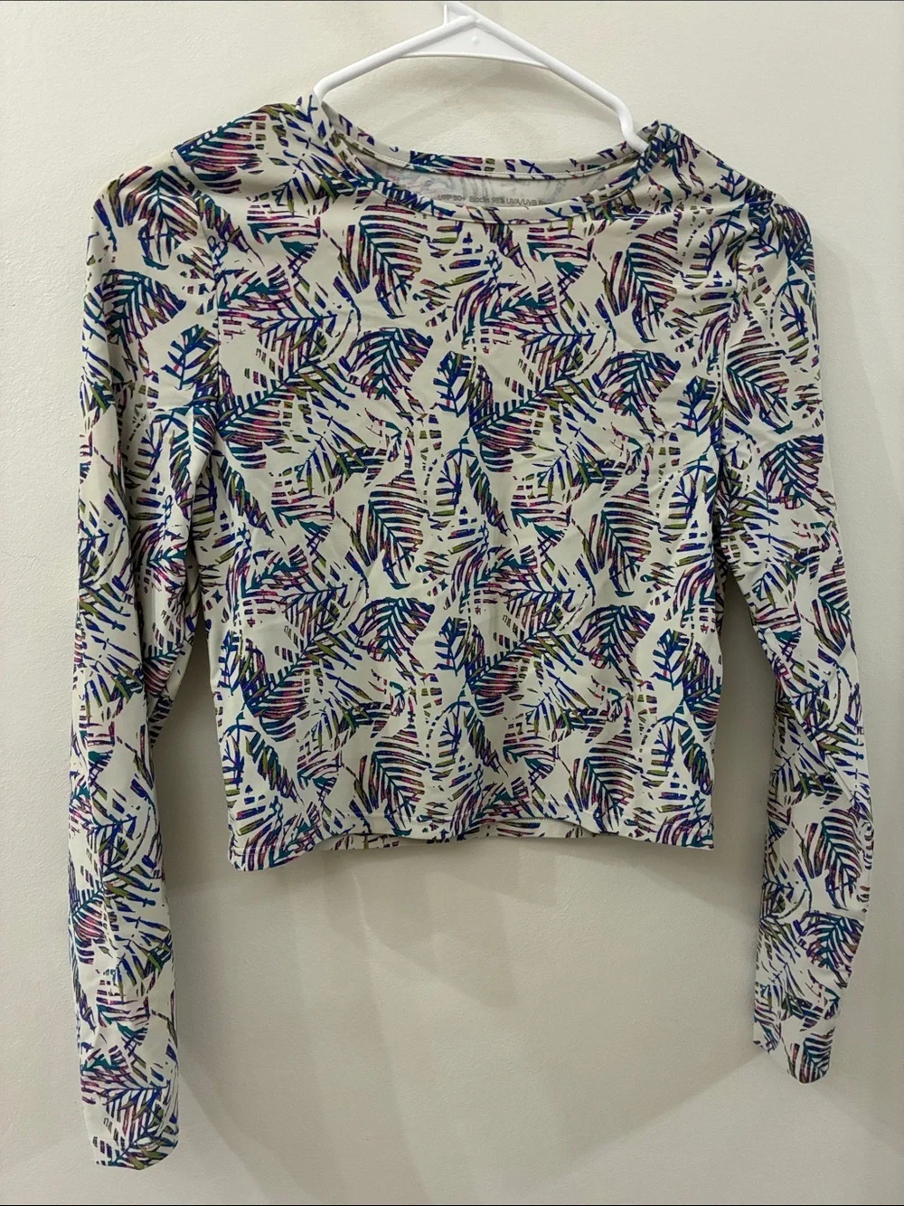 Coolibar Women’s Long Sleeve Crewneck rash guard — XS - tropical print